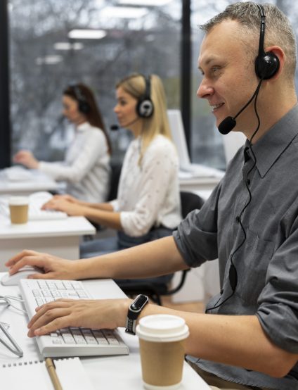 colleagues-working-together-call-center-office-with-coffee